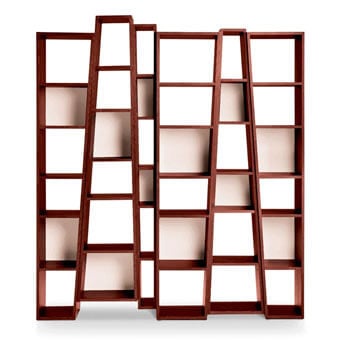 Modular bookcases, reddish-brown wood, grid structure with angled arrangement displaying empty rectangular cubbies in a studio setting.
