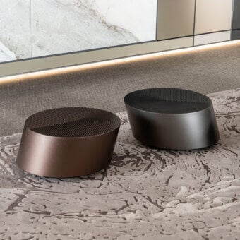 Distinguished Bizzotto Italia Plinko coffee table crafted with bronze-toned lacquered metal and radially grooved top