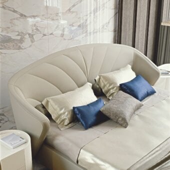 Lavish Bizzotto Italia Wave bed with creamy white fabric upholstery and fan-shaped headboard design