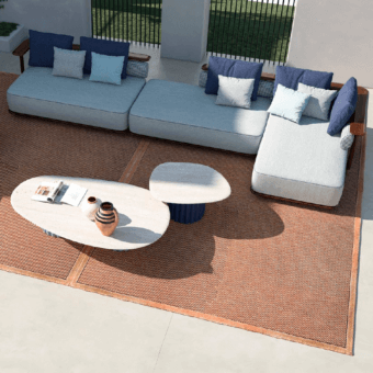 Distinguished CPRN Homood Pedro sectional with light gray waterproof fabric and dark blue pillows crafted in Italy