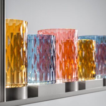 Exceptional Italamp Galatea suspension lamp with metal structure supporting hand-cut crystal diffusers in amber, blue and coral hues