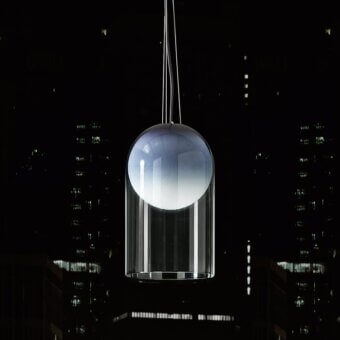 Elegant Italamp Muna suspension lamp with blown white glass sphere encased in a transparent ruled dome with blue shading