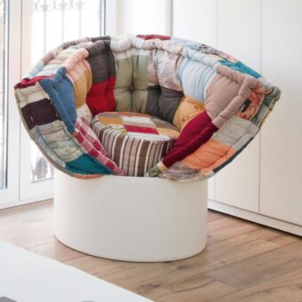 Lago huggy lounge chair, patchwork upholstery, rounded cocoon shape, denim, cotton, linen, blue, green, yellow, red, white.