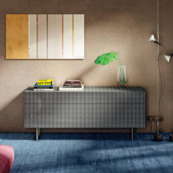 Superior Lago Materia dresser with legs exhibiting precious gray plaid XGlass and golden-finish metal construction