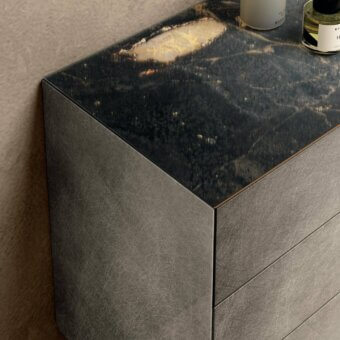 Superior Lago Materia Suspended dresser crafted in dark gray XGlass with a stone-like top and gold accents
