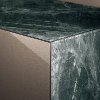 Superior Lago Materia Vertical dresser with green-toned marble and warm brown textured side panels in glossy and matte finishes