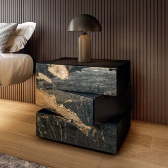 Exceptional Lago Morgana nightstand with swirling gold and beige tones set against a dark base and rotating drawers