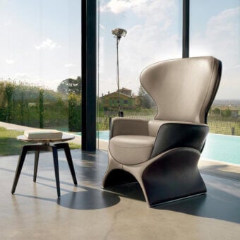 Exceptional Mascheroni Barbablu lounge chair with light beige seating and dark leather-upholstered base crafted in Italy