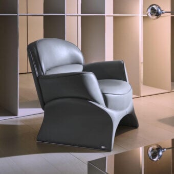 Distinguished Mascheroni La Goccia lounge chair crafted in supple gray leather with a smooth matte finish