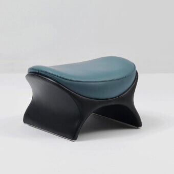 Captivating Mascheroni La Goccia ottoman crafted in smooth blue-green leather with a dark matte base showcasing sculptural form
