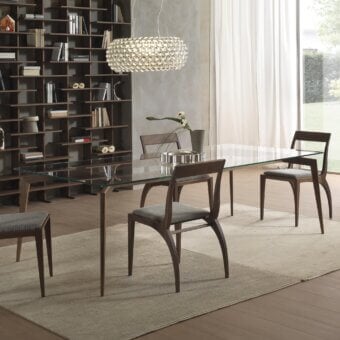 Elegant Pacini & Cappellini Hope table with a rectangular glass top and smooth medium-toned brown solid wooden legs