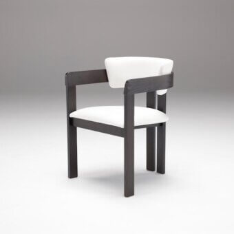 Elegant Pacini & Cappellini Ines armchair with solid wood and crisp white textile upholstery in a dark matte finish