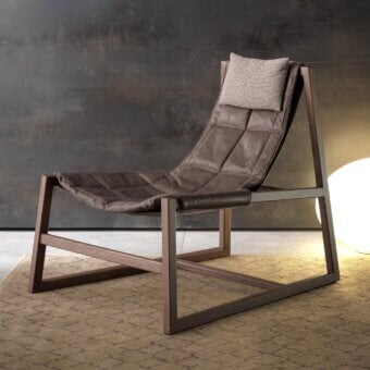 Sophisticated Pacini & Cappellini relax lounge chair with quilted brown leather and woven beige headrest in matte brown wood