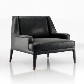 Distinguished WAYNE Enterprises WE-111 lounge chair upholstered in black leather with sleek metal feet embodies streamlined design crafted in Italy