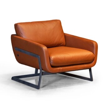 Exceptional WAYNE Enterprises WE-113 lounge chair with warm brown leather upholstery and sleek dark metal frame