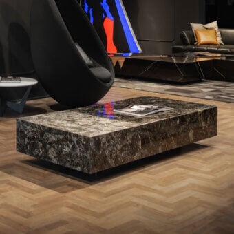 Exclusive WAYNE Enterprises WE-125 coffee table in dark mottled marble with a glossy flamed finish