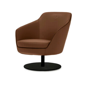 Exclusive WAYNE Enterprises lounge chair in light brown leather-like textile with black metal base and embossed emblem