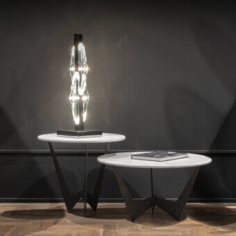 Exceptional WAYNE Enterprises WE-142 side table with marble-like top and matte black geometrically-shaped metal base crafted in Italy