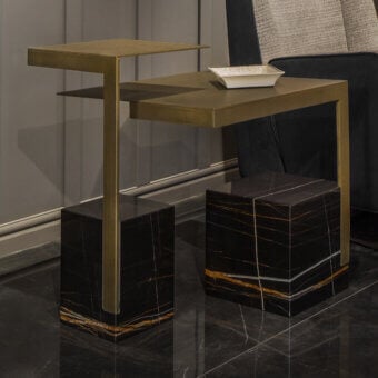 Distinguished WAYNE Enterprises WE-202 side table with geometric silhouette and golden metal tiers built with black marble-like bases veined in gold and white