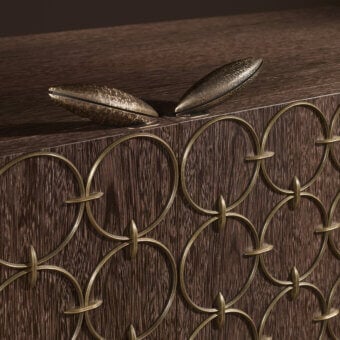 Distinguished Bellavista Luis sideboard built with Italian poplar, European wood veneer, bronzed metal relief, and saddle-leather drawers