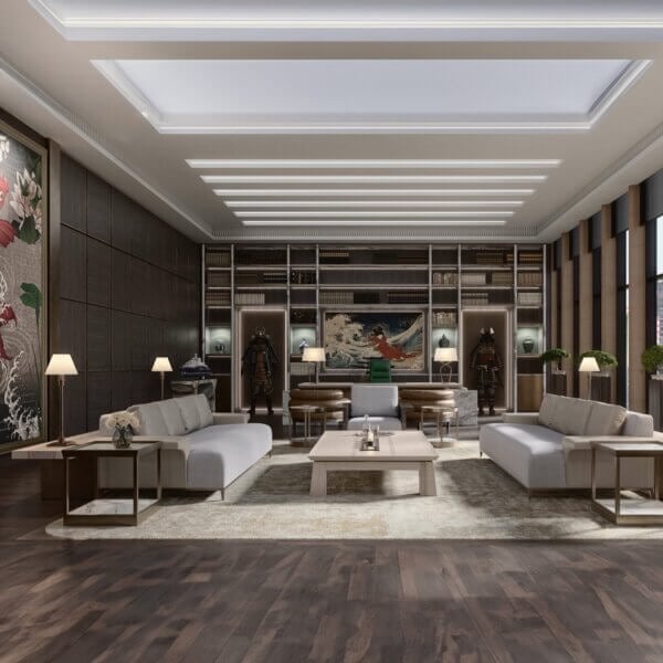 Lounge seating area with light gray sofas, dark wood tables, a textured rug, and built-in shelving displaying art, framed by dark wood paneling.