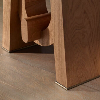 Distinguished Bellavista Diapason table with Italian poplar and oak veneer in a medium-toned brown finish and curved wooden support