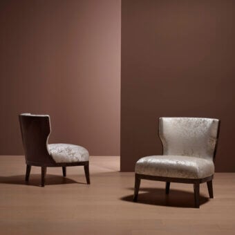Exceptional Bellavista Grace lounge chair with curved Italian poplar wood, light floral textile upholstery and satin finish