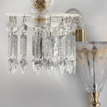 Superior Italamp Margot wall lamp in clear crystal and artistic glass with a matt black metal structure and light gold accents