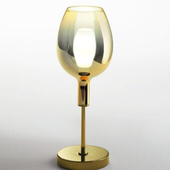 Distinguished Italamp Rosè table lamp with elongated glass diffuser and refined golden metal structure built with a USB power cable