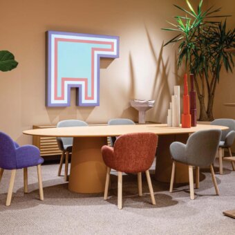 Elegant Moroso Vol table with a light brown birch plywood top and fingerprint-resistant linoleum finish