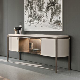 Elegant Turri Pinnacle sideboard with wooden structure, refined leather applications, and light gold metal details in matte white finish