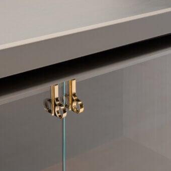 Lavish Turri Pinnacle sideboard with wooden structure, muted gray finish and illuminated extra-clear glass doors