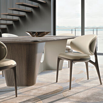 Exclusive Turri Pinnacle table with a rounded natural wood top and sculptural walnut and off-white base with a matte finish