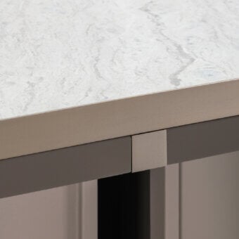 Superior Turri Zero console with marble-patterned top and cylindrical base clad in Italian leathers with platinum accents