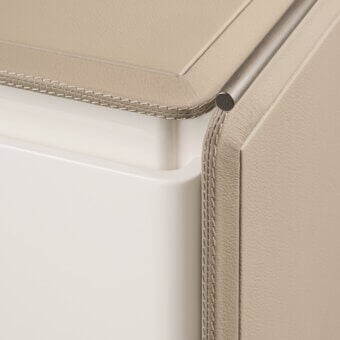 Exclusive Turri Zero nightstand in beige leather with a glossy lacquered shelf and off-white drawer featuring a cylindrical metal handle