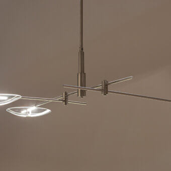 Elegant Turri Zero Suspension Lamp with thin metal structure and clear glass discs in silver or gray satin finish