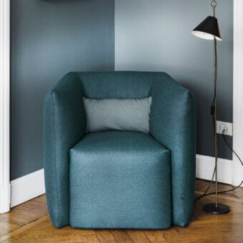 Sophisticated Bolzan Letti Jill lounge chair upholstered in teal textile with a patterned cushion and geometric silhouette