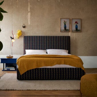 Exceptional Bolzan Letti Noah bed crafted in Italy with dark blue and brown geometric textile upholstery and firwood structure