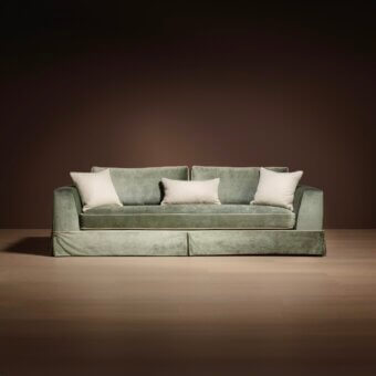 Sophisticated Bellavista Filippo sofa with light green fabric, channeled goose down cushions and concealed ashwood feet