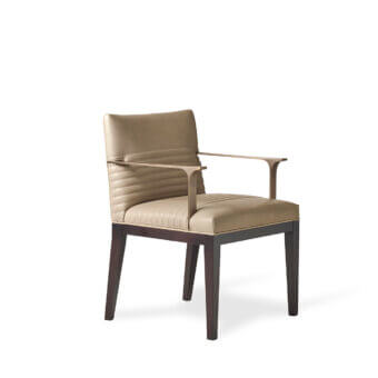 Elegant Bellavista Masaryk chair with light tan upholstery, solid Moka Beechwood base and cast brass armrests