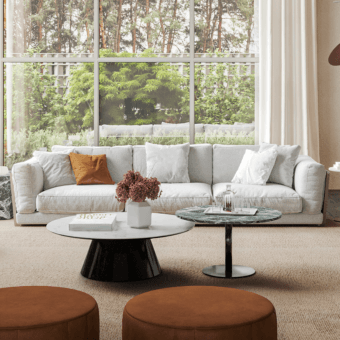 Formitalia framed sofa, light gray fabric, modular design with terracotta pillows and ottomans, marble coffee table, neutral room setting.