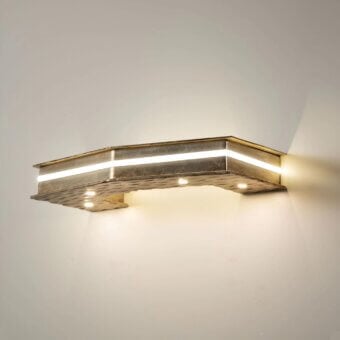 Distinguished Stillux Otto wall lamp with geometric half-octagonal structure crafted in gold or bronze with integrated LEDs