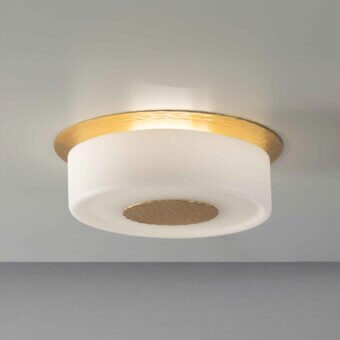Distinctive Stillux Rock ceiling lamp with a gold-toned hammered steel structure and handmade glossy white blown glass diffuser