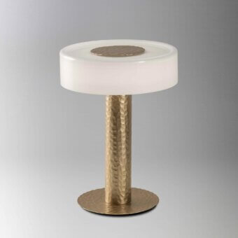 Distinguished Stillux Rock table lamp crafted in Italy with hammered steel base and handmade matt white blown glass diffuser