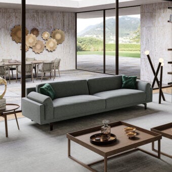 Exceptional Swan Italia Berry sofa with light gray textile upholstery, metal frame and burnished metal feet crafted in Italy
