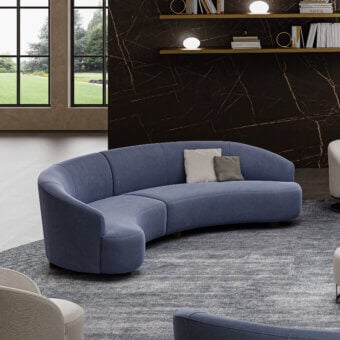 Elegant Swan Italia Venere sectional upholstered in muted blue textile with matte finish and wenge-stained wooden feet