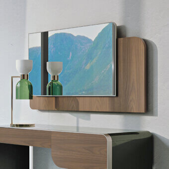 Turri Soul Mirror, walnut wood, asymmetrical frame with shelf; reflects mountains, paired with brass and glass lamps on a curved console table.