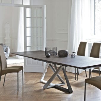 Distinguished Bontempi Millennium table crafted in Italy with a dark wood-like top and uniquely designed intersecting white and dark gray metal base