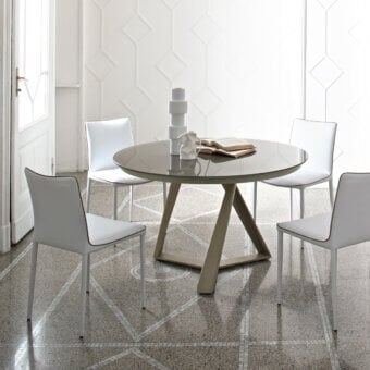 Distinguished Bontempi Millennium table with a glossy glass top and geometric painted wood composite base in neutral grey tones