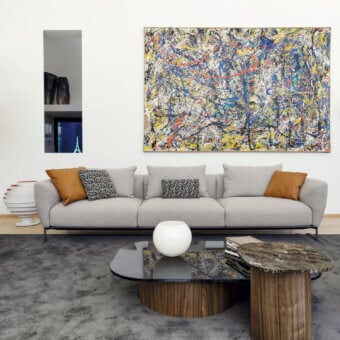 Superior Horm Ella sofa, a three-seater upholstered in light gray textile with smooth matte finish and dark metal base